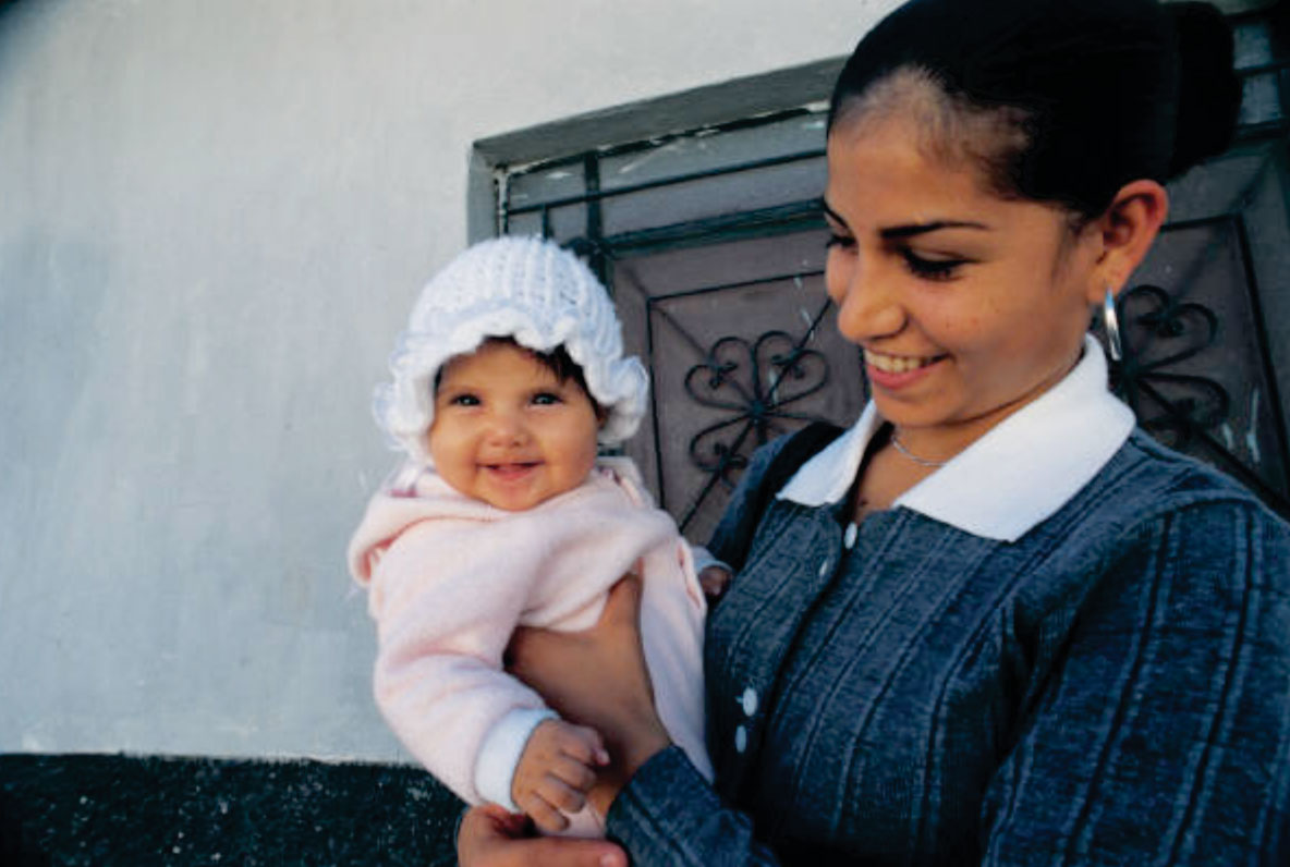 Image of Mom holding her baby.